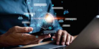 Person using smartphone and laptop with AI hologram