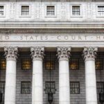 Renovation Standoff Triggers Demolition Fears United States courthouse facade with Corinthian columns