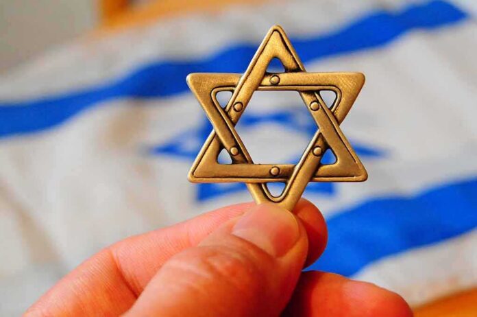 Star of David pendant held by hand