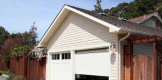 Detached garage with partially open door