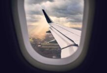 airplane wing seen from window during descent
