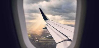 airplane wing seen from window during descent