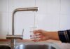 Gulf Lifelines Targeted – Tehran Raises Stakes Hand filling a glass with water from a kitchen faucet