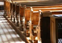 Gunman Crashes In – Heroic Shielding Amid Church Carnage wooden church pews in sunlight
