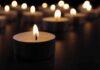 Knife Attack Stuns Chatham Neighborhood – Seven-Year-Old Killed Tealight candle burning with soft glow