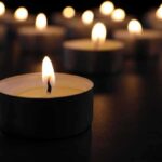 Knife Attack Stuns Chatham Neighborhood – Seven-Year-Old Killed Tealight candle burning with soft glow