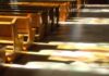SANCTUARY TSUNAMI Ahead – 100,000 Churches On The Block Wooden church pews with stained glass light on the aisle