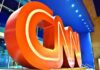 CNN Praises MAGA? Trump Hypes The Clip Large red CNN logo sculpture at building entrance