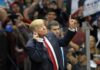 Trump Rally Line Explodes Backlash Donald Trump gestures with one hand raised at a crowded event