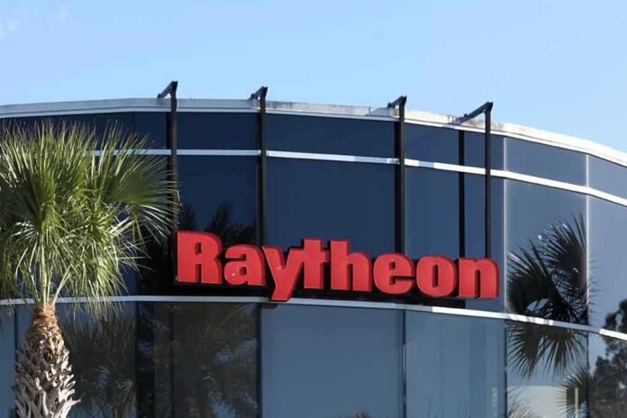 Raytheon logo on a modern glass office building