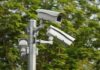 Flock Surveillance – Warrantless Plate Dragnet CRUSHED surveillance cameras mounted on a metal pole