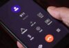 Smartphone screen dialing 911 emergency number
