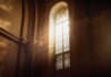 Shock Timing: Pope Condemns, Trump Advances Execution sunlit stained glass window in a church interior
