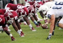 Suspended Over… What? Video Comes Up Empty American football players lined up at the line of scrimmage